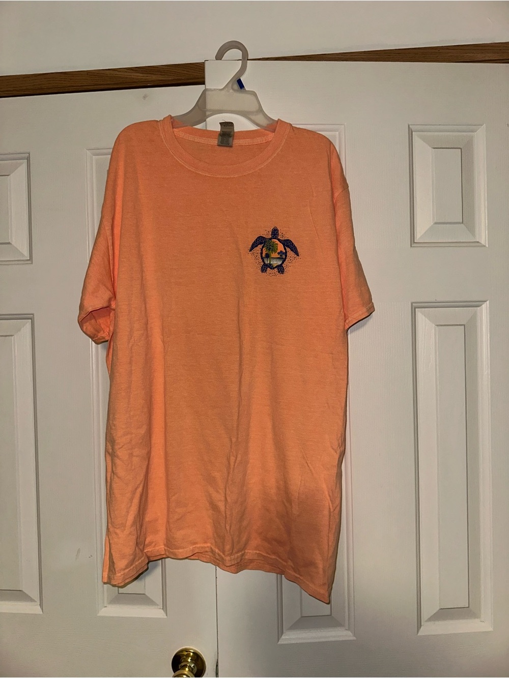 Women’s Peach Short-Sleeve Graphic Tee with Turtle Emblem
